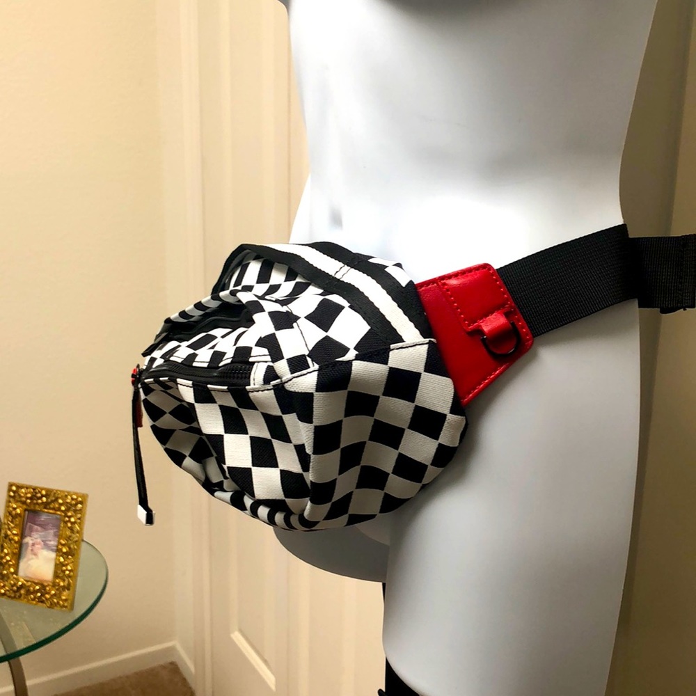 Hip bag.Never used . 2 zipper compartments . Red, white and black checkered .